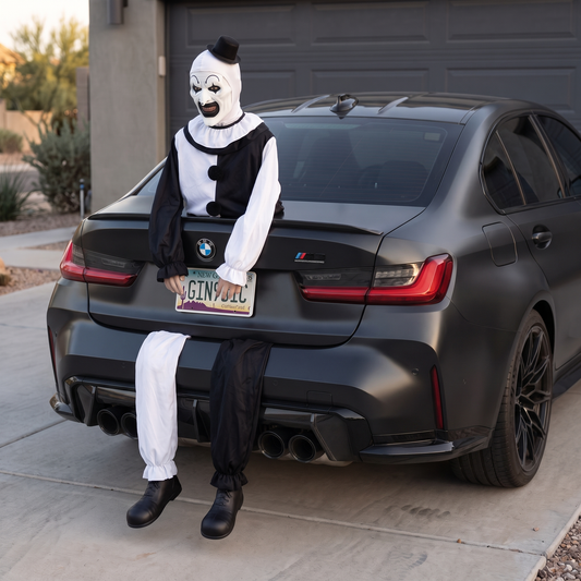 The Jester on the trunk of a black sedan